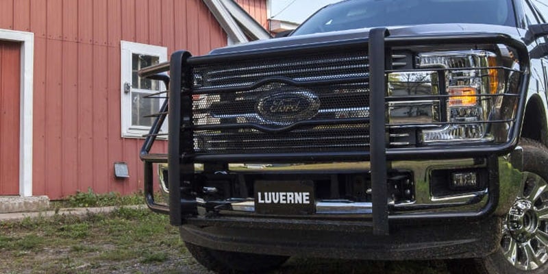 Luverne grill guard on Ford F-150 in front of red barn