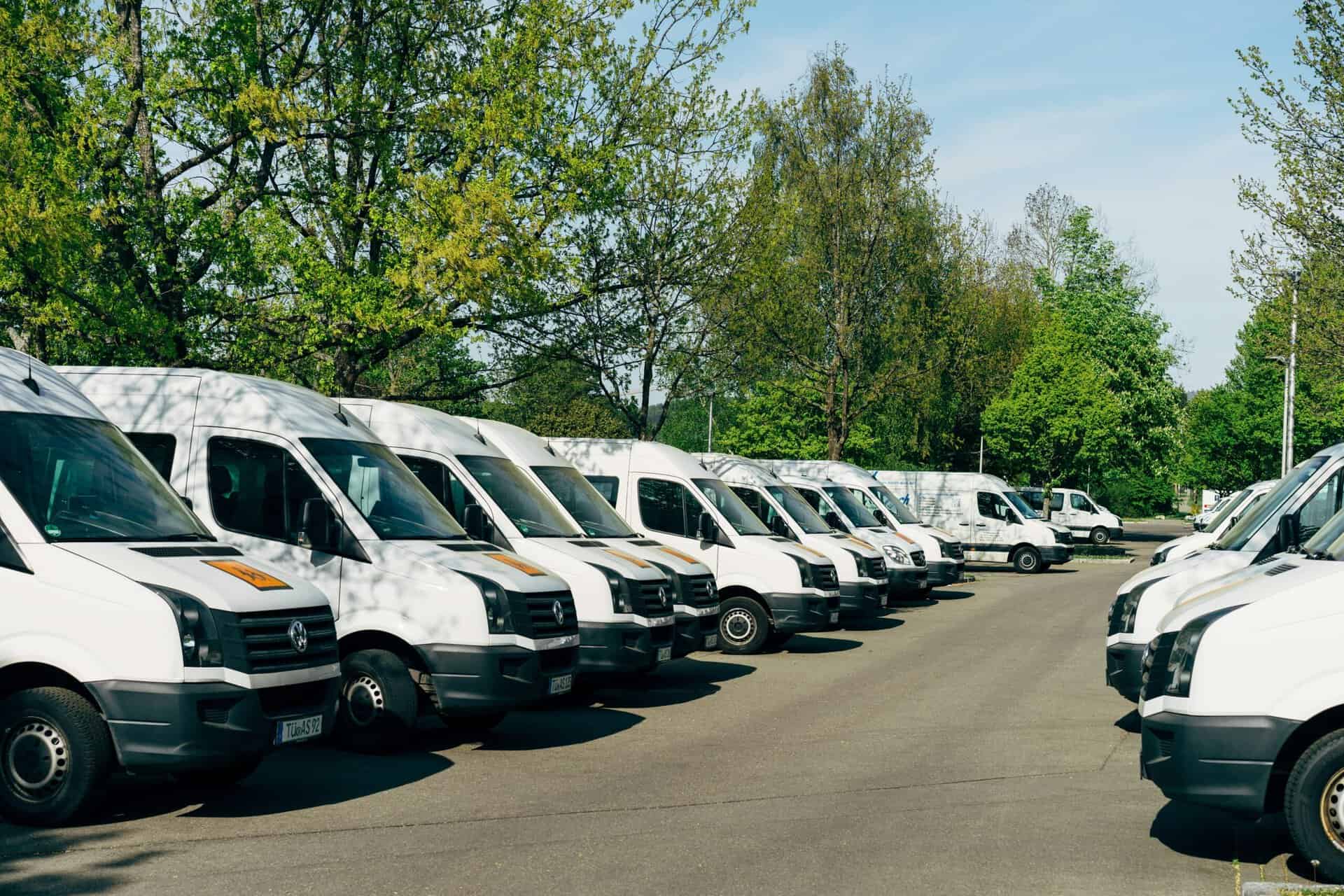 fleet of work vans and trucks